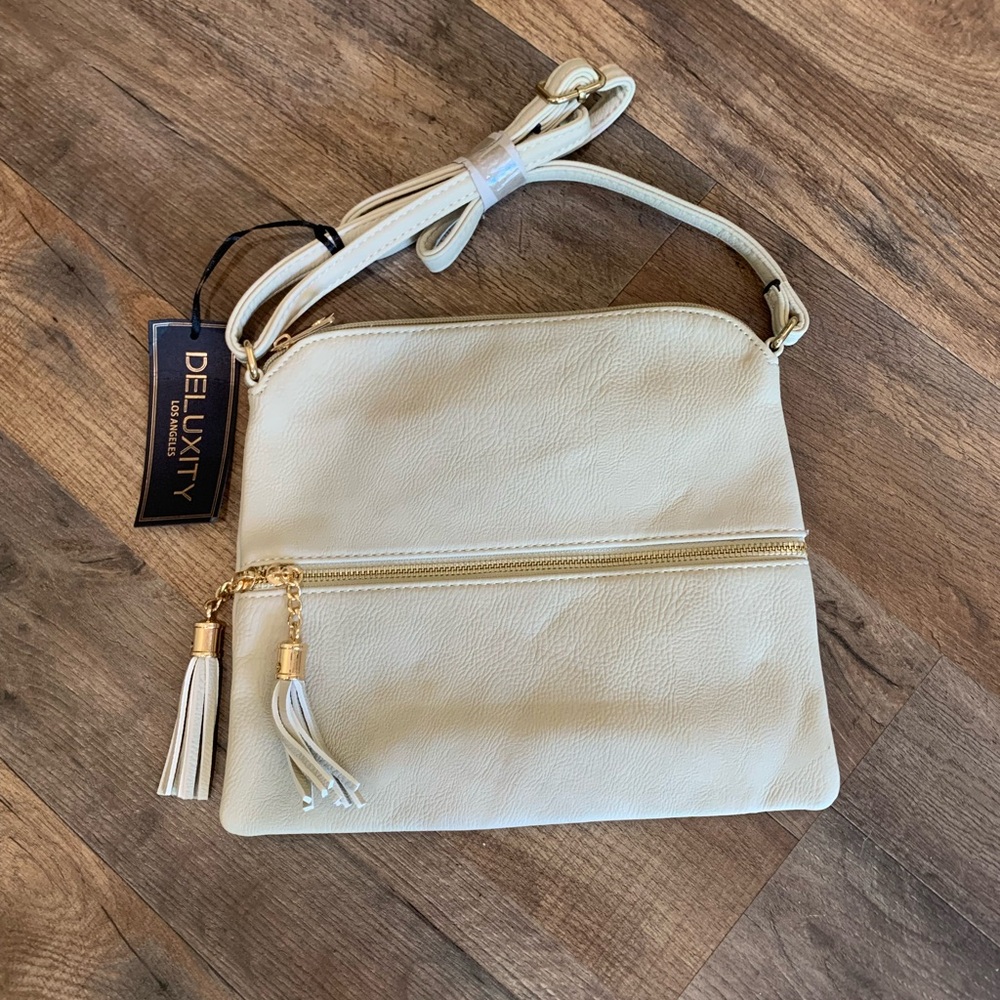 Cream Crossbody Bag with Gold Hardware and Tassels